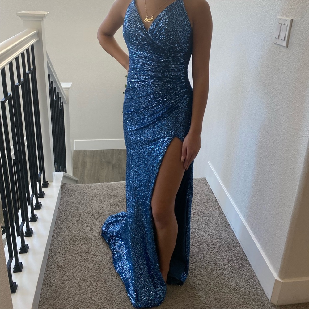 Blue sequence dress with a slit